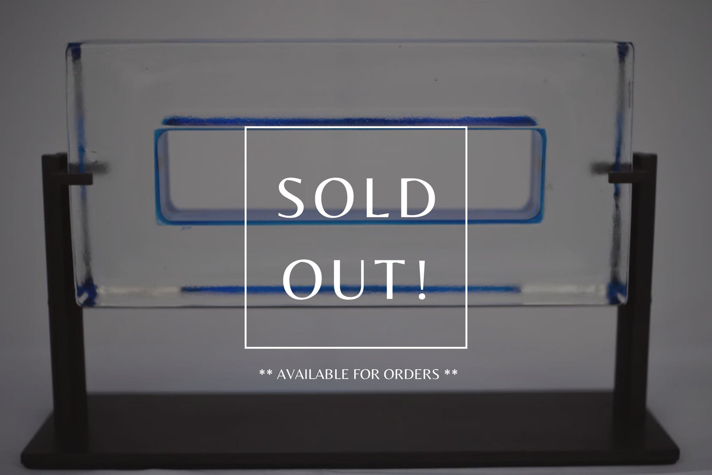 Horizontal Glass Sculpture on Metal Stand